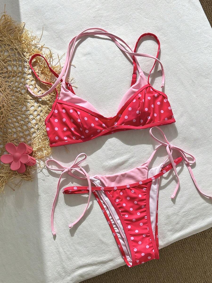Women's retro polka dot high waist bikini swimsuit set with spaghetti straps and knot tie-back top.