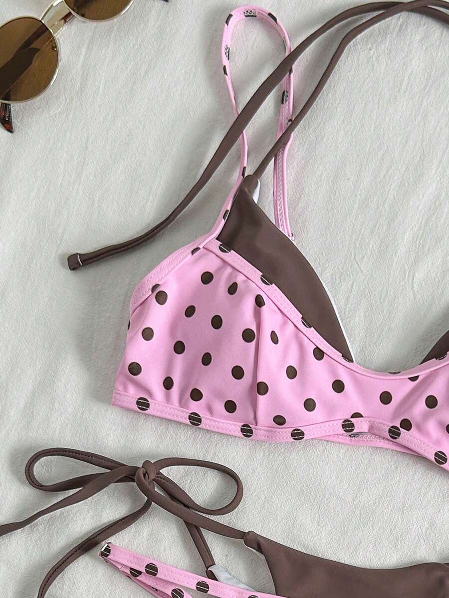 Women's retro polka dot high waist bikini swimsuit set with spaghetti straps and knot tie-back top.