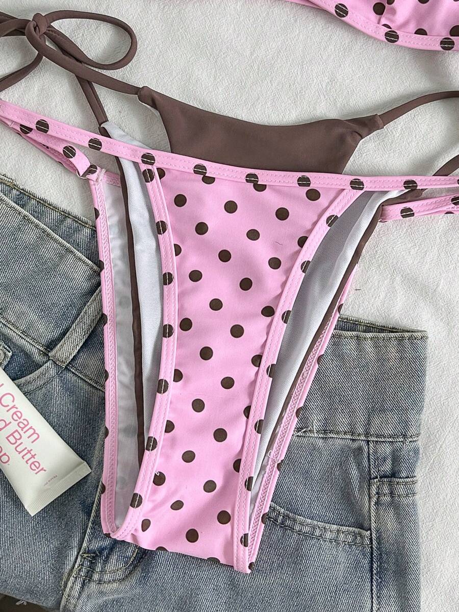 Women's retro polka dot high waist bikini swimsuit set with spaghetti straps and knot tie-back top.