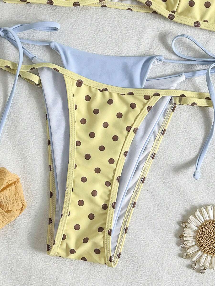 Women's retro polka dot high waist bikini swimsuit set with spaghetti straps and knot tie-back top.