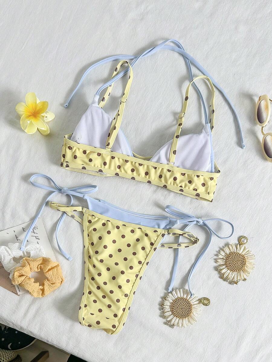 Women's retro polka dot high waist bikini swimsuit set with spaghetti straps and knot tie-back top.