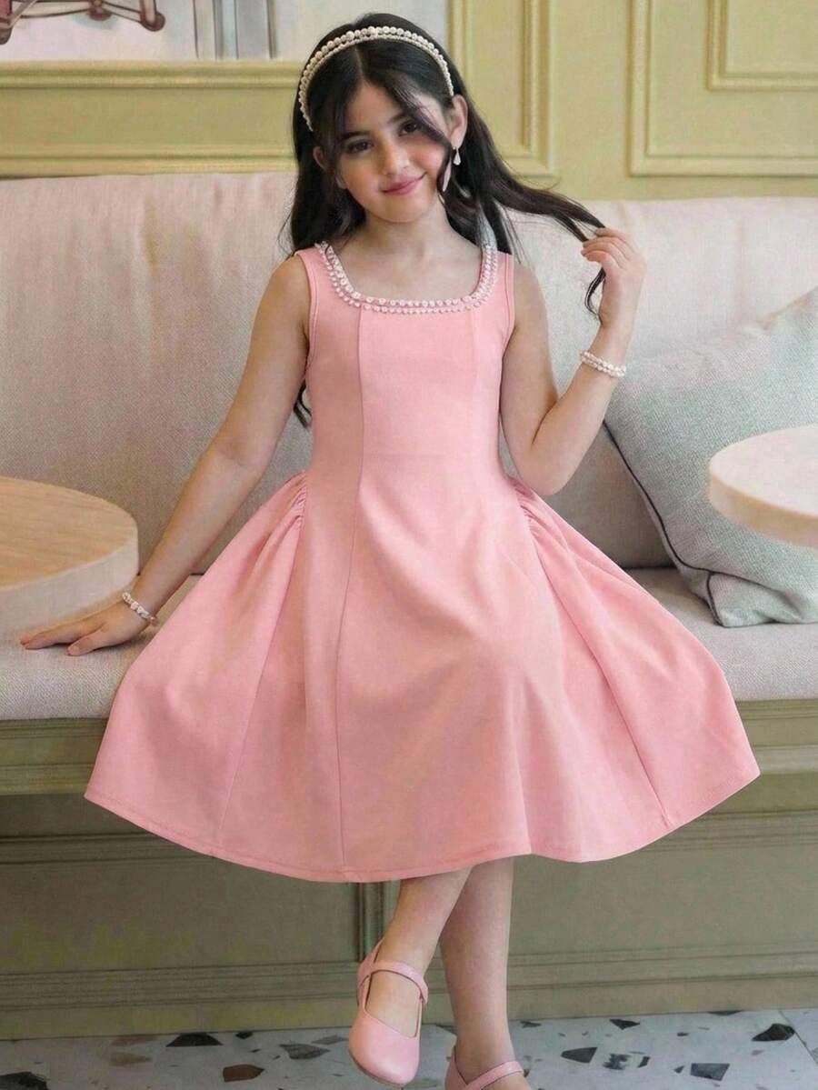 Sleeveless pink square neck A-line dress for tween girls featuring pearl embellishments and a high-waist slim fit design.