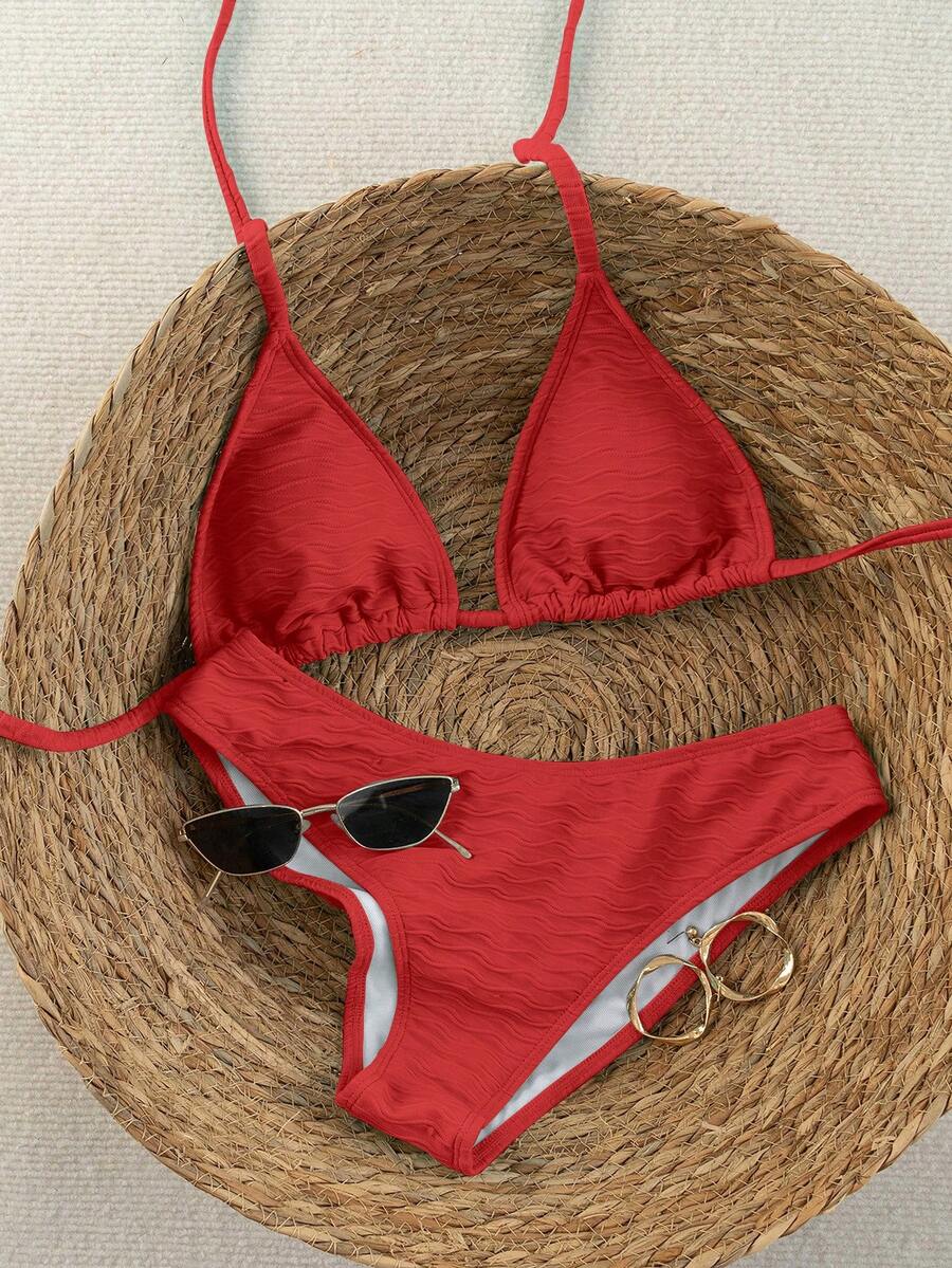 Women's apricot 2-piece halter bikini set featuring a wireless triangle top with tie-back detail and high-waisted high-cut bottoms.