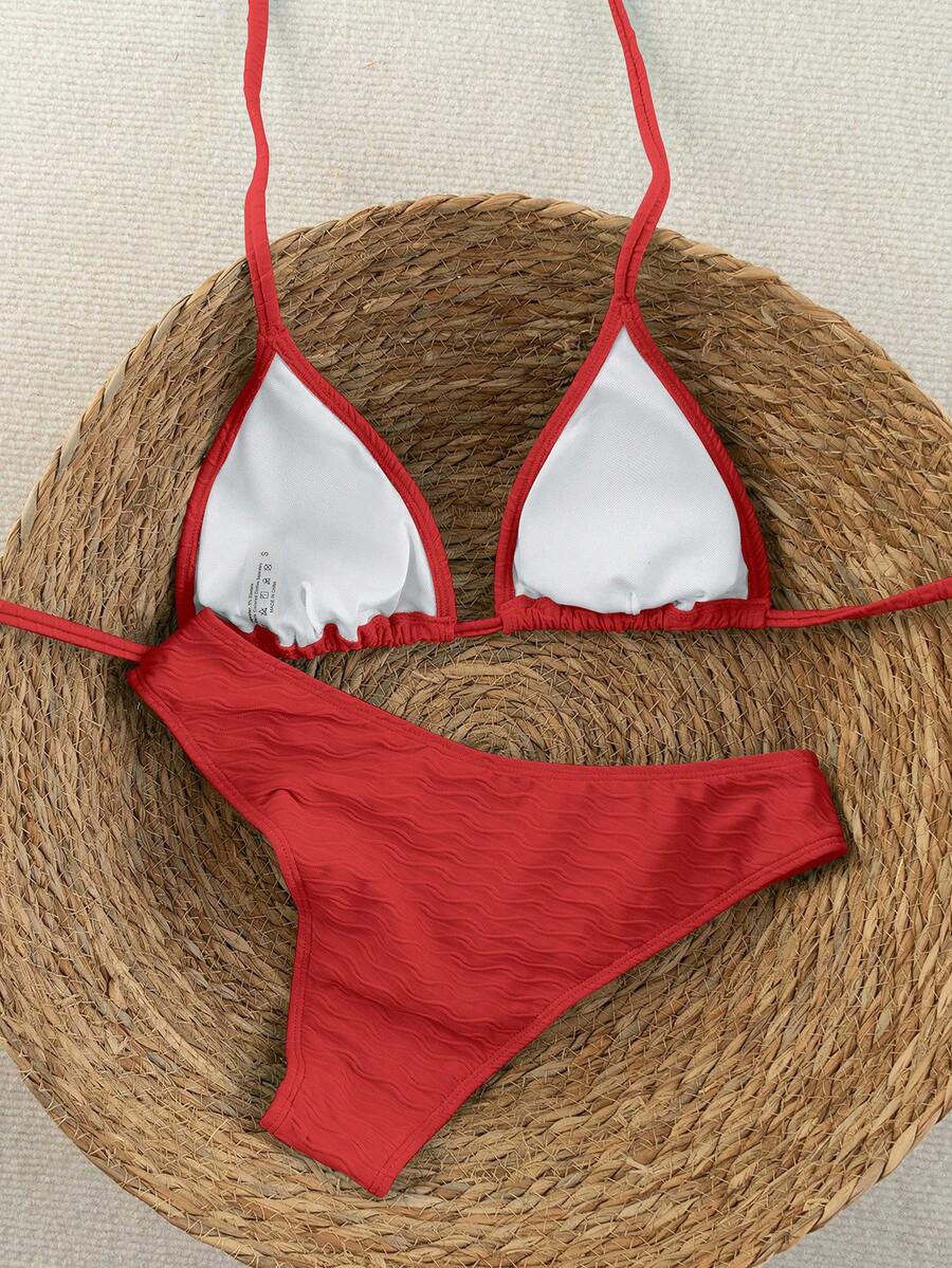 Women's apricot 2-piece halter bikini set featuring a wireless triangle top with tie-back detail and high-waisted high-cut bottoms.