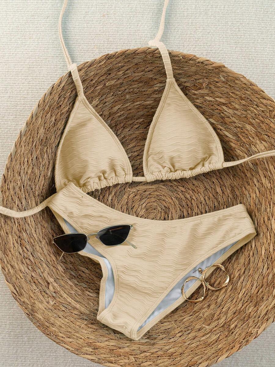 Women's apricot 2-piece halter bikini set featuring a wireless triangle top with tie-back detail and high-waisted high-cut bottoms.