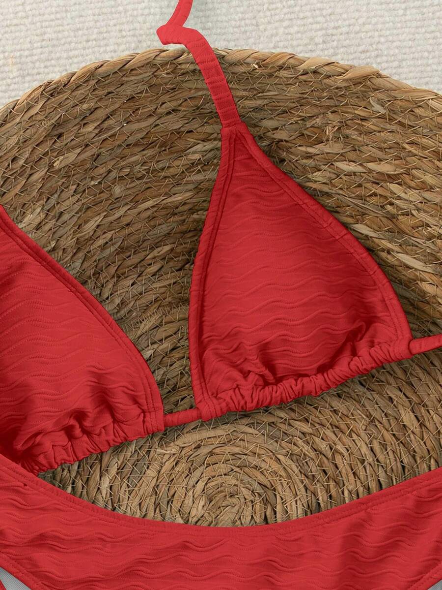 Women's apricot 2-piece halter bikini set featuring a wireless triangle top with tie-back detail and high-waisted high-cut bottoms.