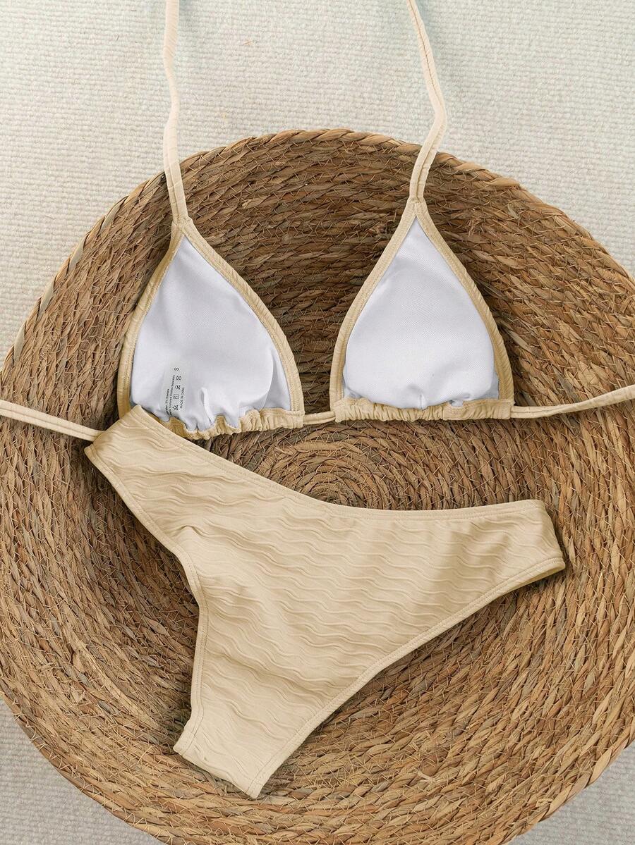 Women's apricot 2-piece halter bikini set featuring a wireless triangle top with tie-back detail and high-waisted high-cut bottoms.
