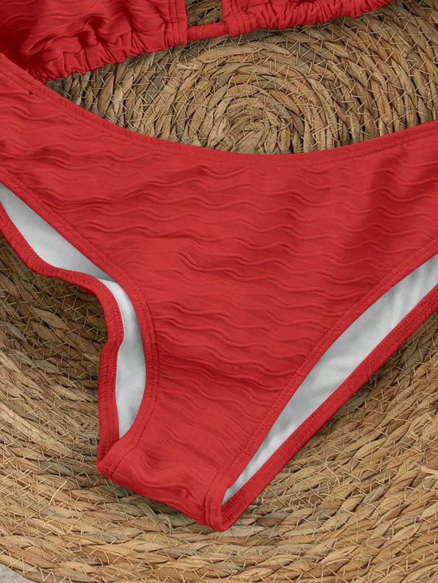 Women's apricot 2-piece halter bikini set featuring a wireless triangle top with tie-back detail and high-waisted high-cut bottoms.