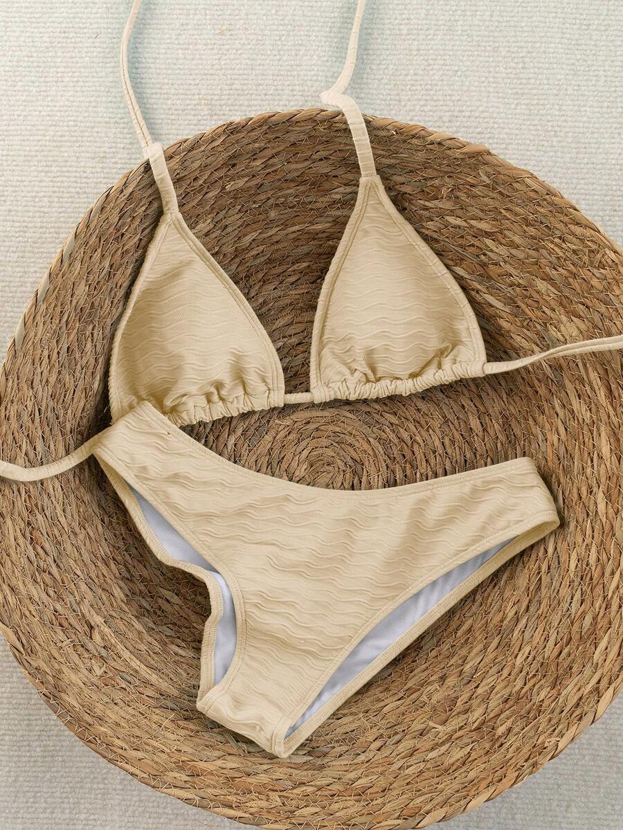 Women's apricot 2-piece halter bikini set featuring a wireless triangle top with tie-back detail and high-waisted high-cut bottoms.