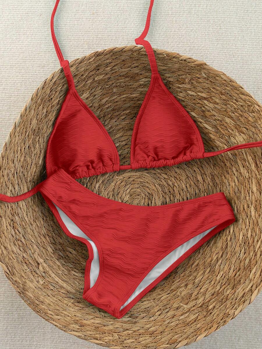 Women's apricot 2-piece halter bikini set featuring a wireless triangle top with tie-back detail and high-waisted high-cut bottoms.