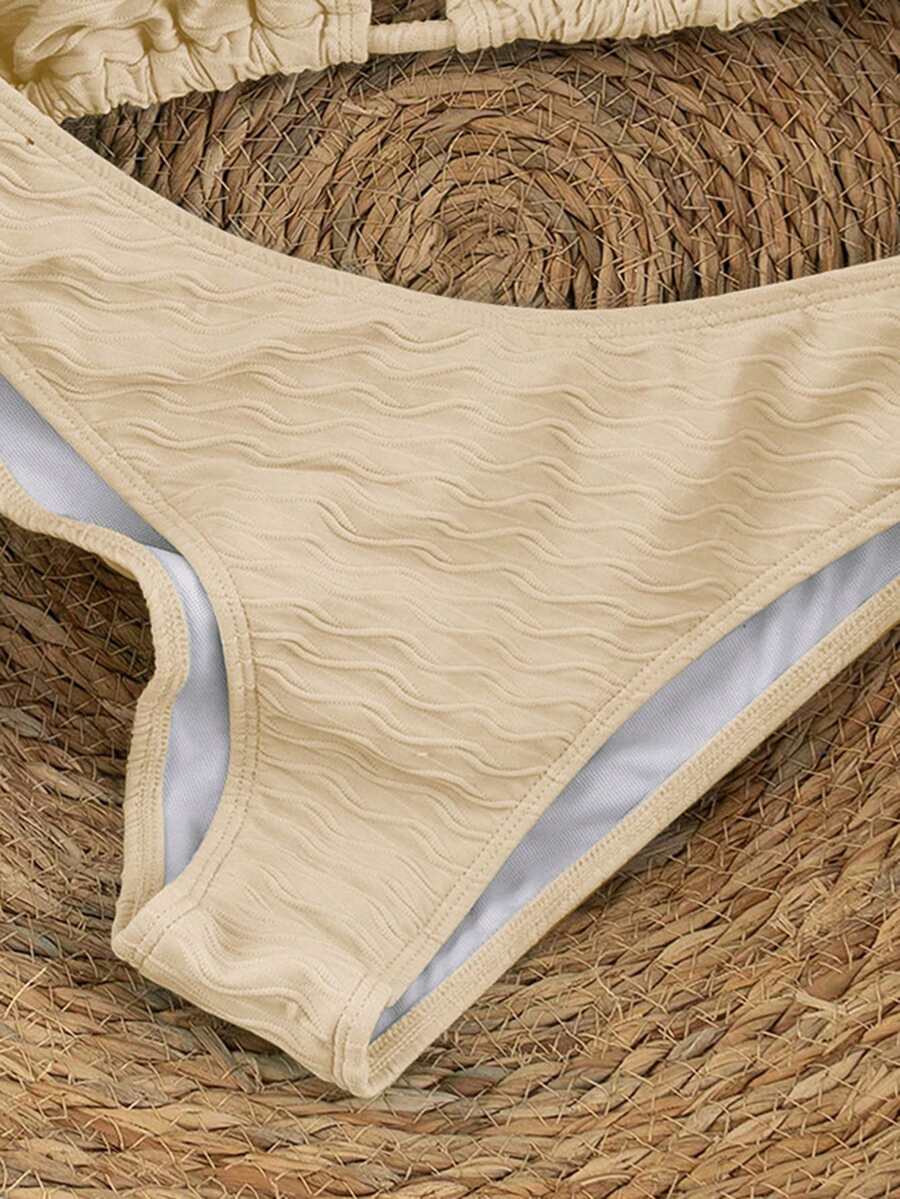 Women's apricot 2-piece halter bikini set featuring a wireless triangle top with tie-back detail and high-waisted high-cut bottoms.