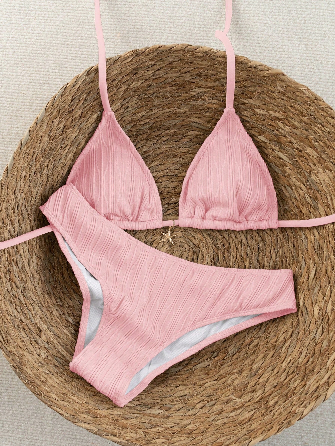 Women's apricot 2-piece halter bikini set featuring a wireless triangle top with tie-back detail and high-waisted high-cut bottoms.