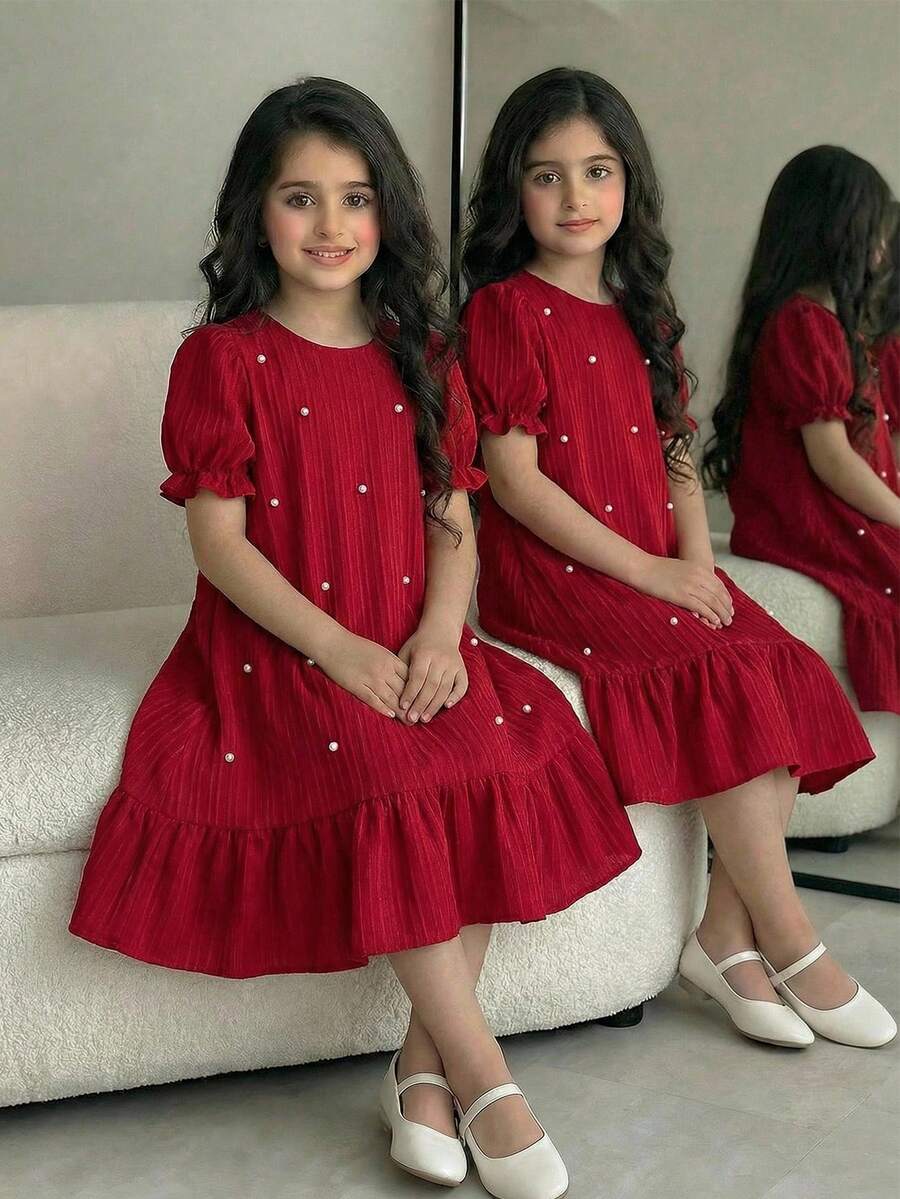 Tween girl blue and white striped A-line casual dress featuring round neck, puff short sleeves, high waist, and flounce ruffle hem.