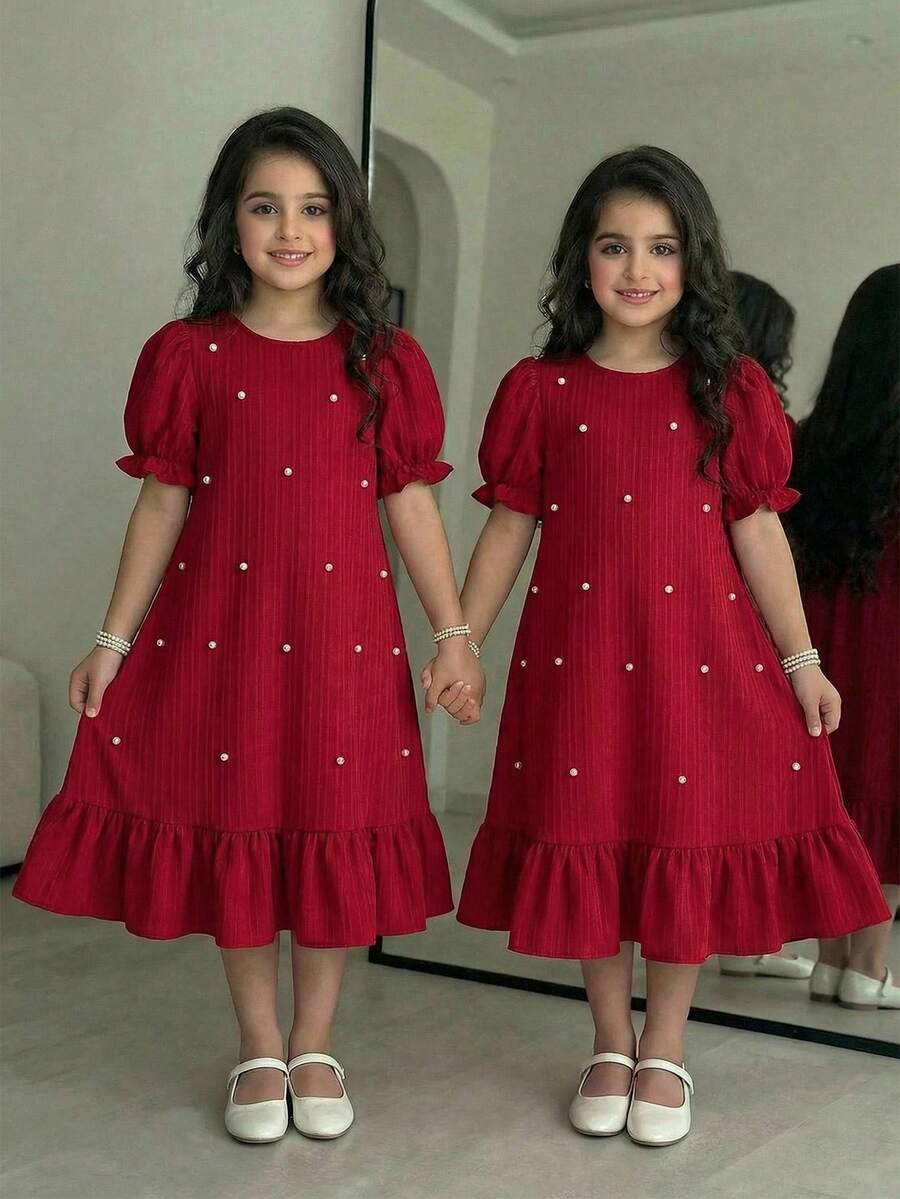 Tween girl blue and white striped A-line casual dress featuring round neck, puff short sleeves, high waist, and flounce ruffle hem.