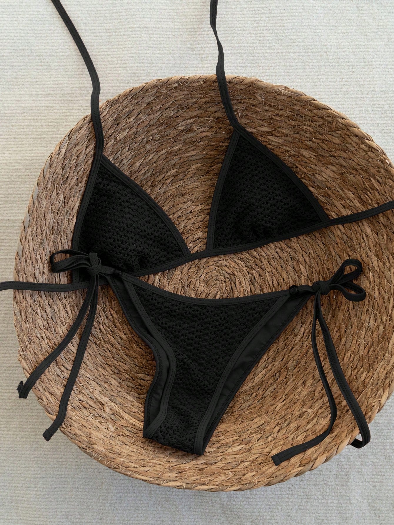 Women's apricot solid halter tie bikini top with triangle cups and matching tie-side swimsuit bottoms.