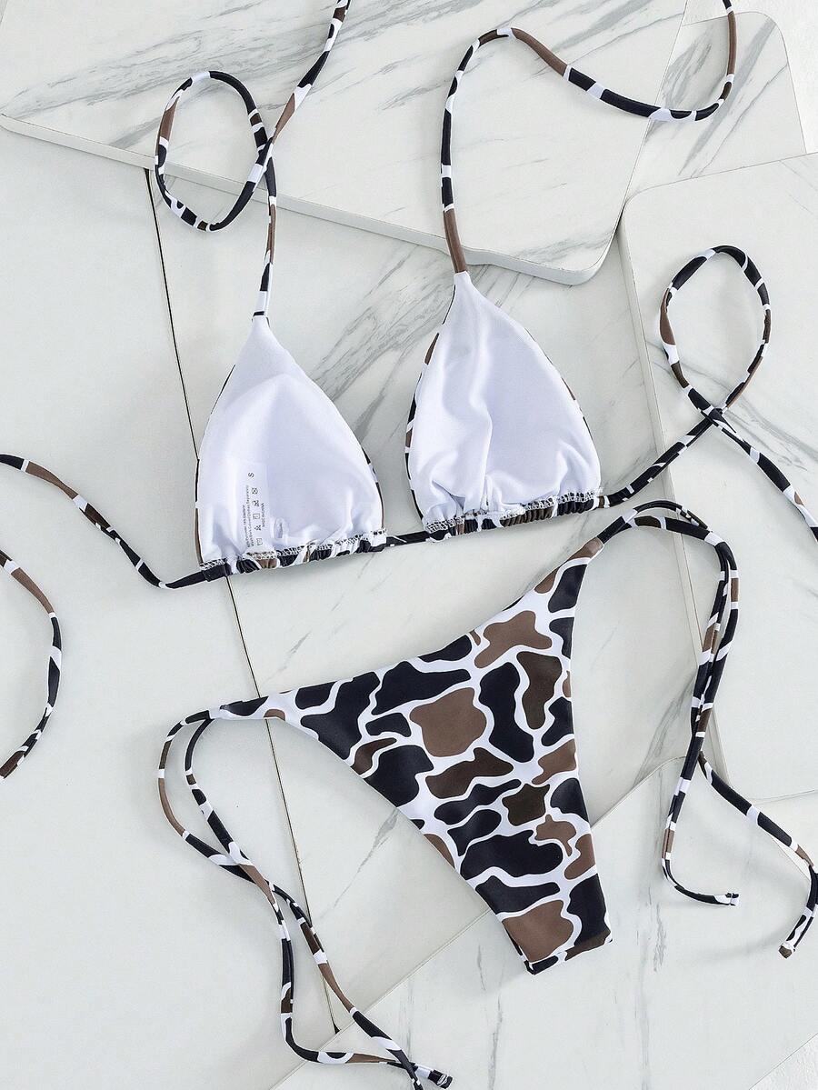 Women's two-piece black bikini set showing a halter triangle tie-back top and matching side-tie bikini bottoms.