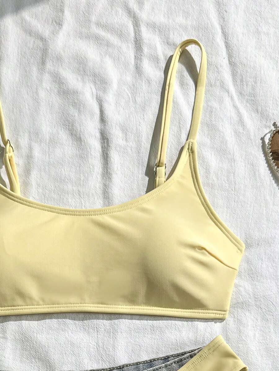 Apricot ribbed high waist two piece bikini swimsuit set for women featuring backless spaghetti strap top and high waisted bottoms.