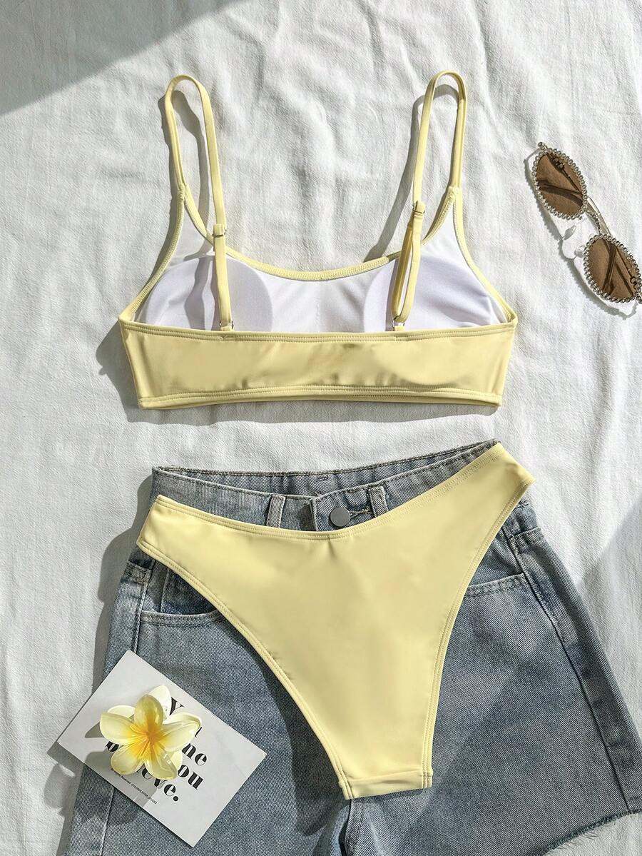 Apricot ribbed high waist two piece bikini swimsuit set for women featuring backless spaghetti strap top and high waisted bottoms.