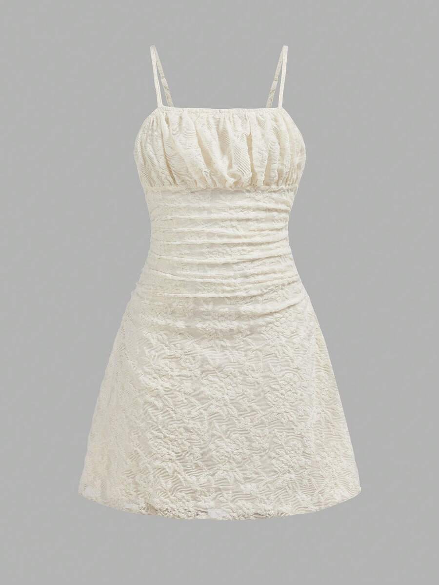 Apricot tween girls sleeveless halter cami dress with appliques, bow front, zipper detail, high waist, flared hem, and short slim fit design.