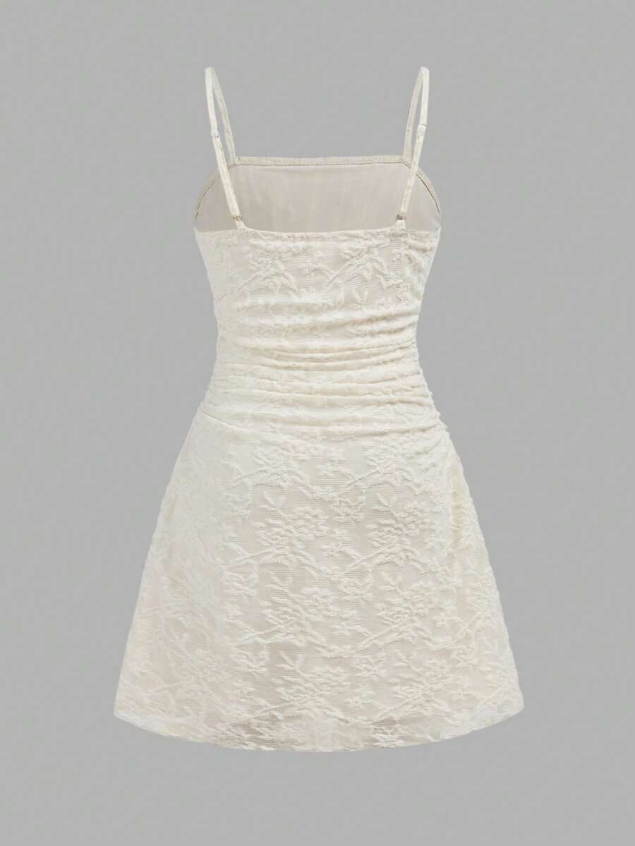 Apricot tween girls sleeveless halter cami dress with appliques, bow front, zipper detail, high waist, flared hem, and short slim fit design.