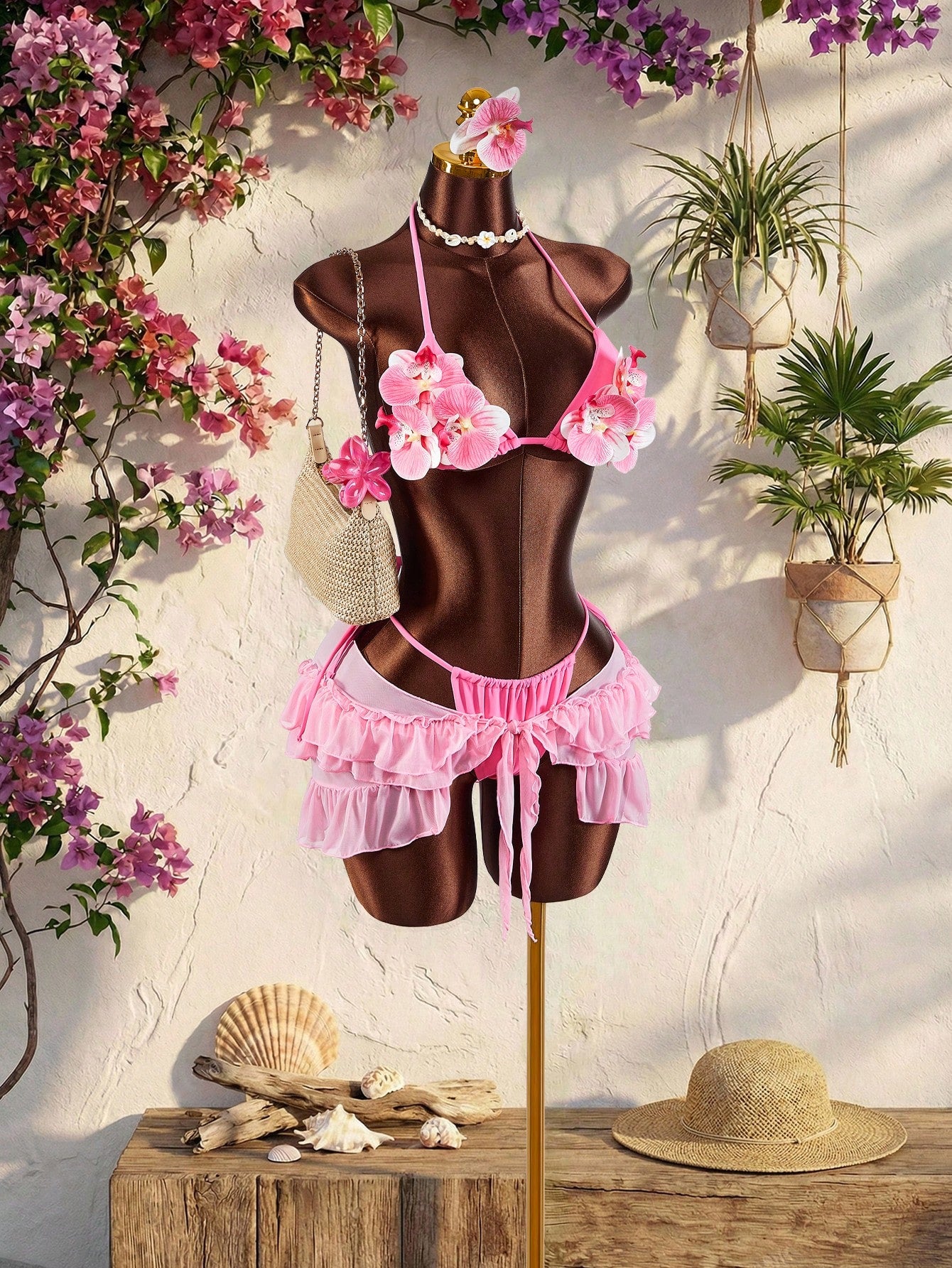 Women's 3-piece blue bikini swimwear set featuring a crop top with 3D rose accents, tie back detail, spaghetti straps, and tie-side bottoms.