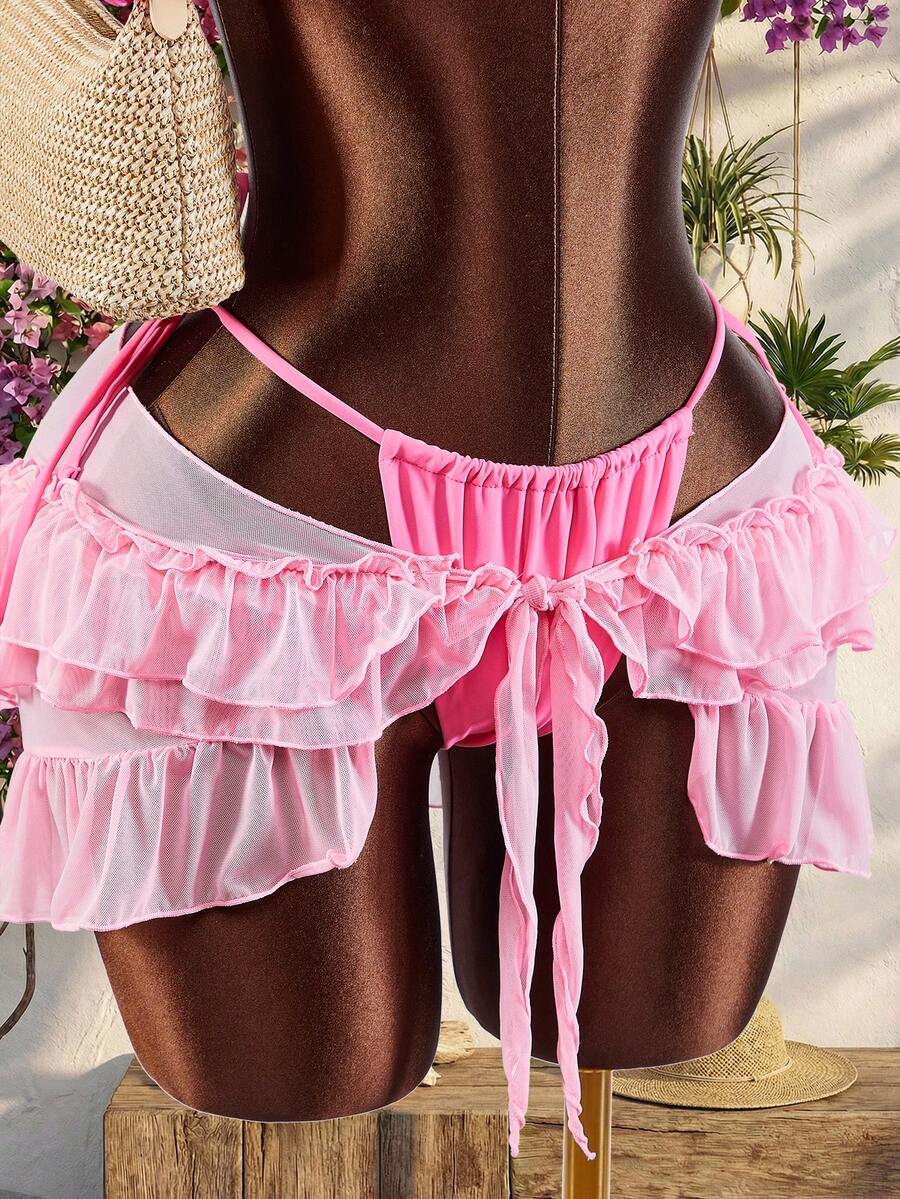 Women's 3-piece blue bikini swimwear set featuring a crop top with 3D rose accents, tie back detail, spaghetti straps, and tie-side bottoms.