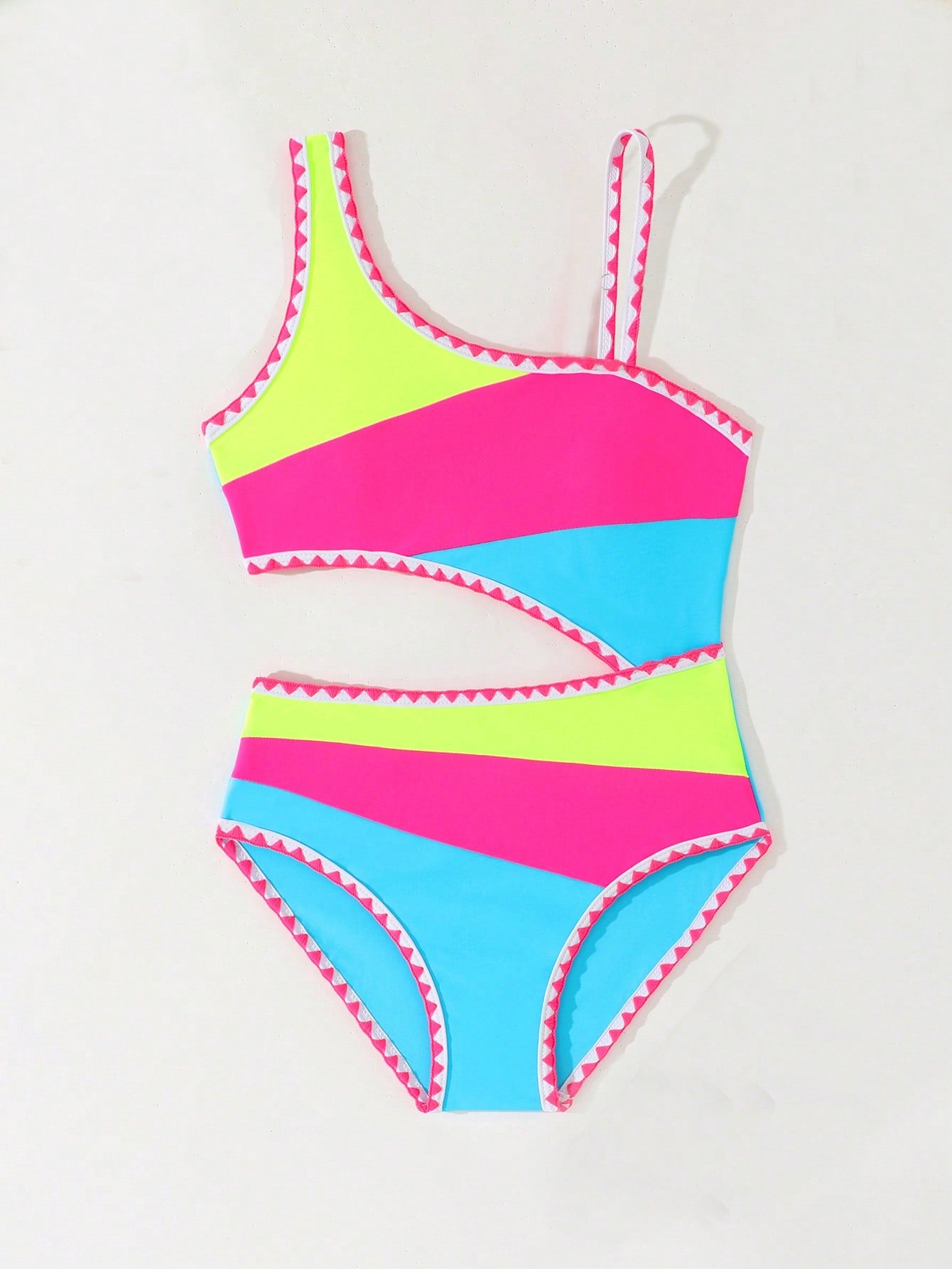 Tween girls one-piece swimsuit featuring an asymmetric neckline, pendant decor, plain design, wireless bra, high-cut bottom, and medium-stretch fabric.