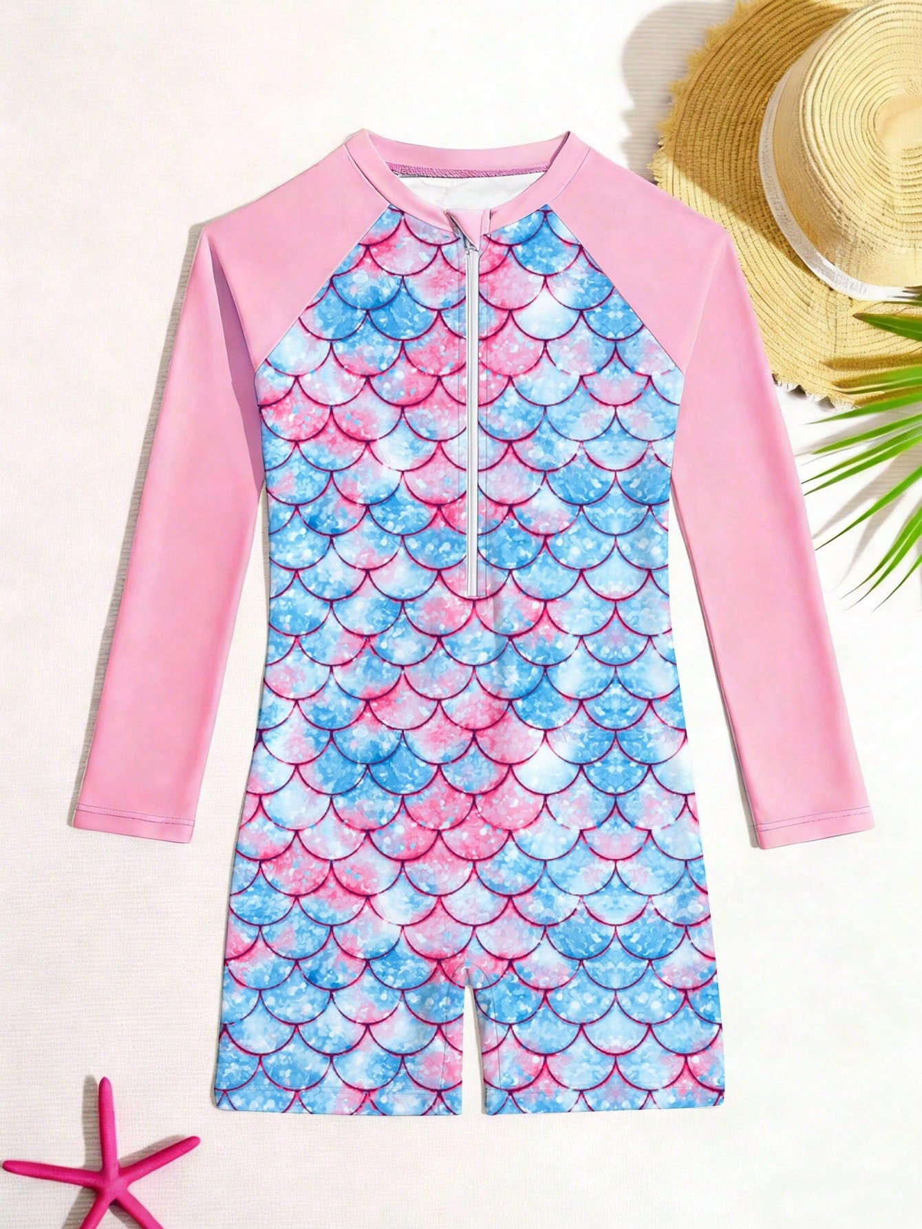 Tween girls one-piece swimsuit featuring a high neck, long sleeves, and shorts bottom, with a back zipper and strawberry plaid digital print on stretch knit fabric. Designed for swimming, vacation, and summer wear.