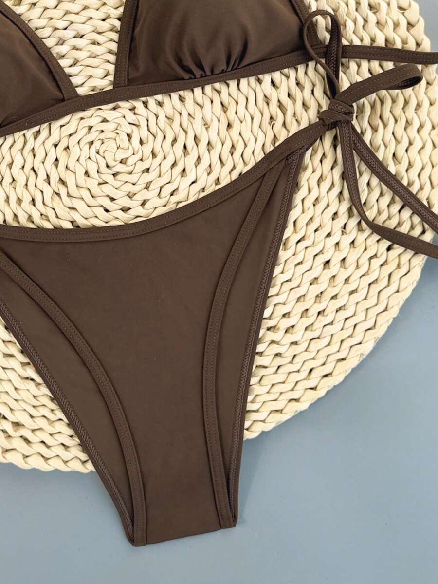Women's apricot solid halter tie bikini top with triangle cups and matching tie-side swimsuit bottoms.