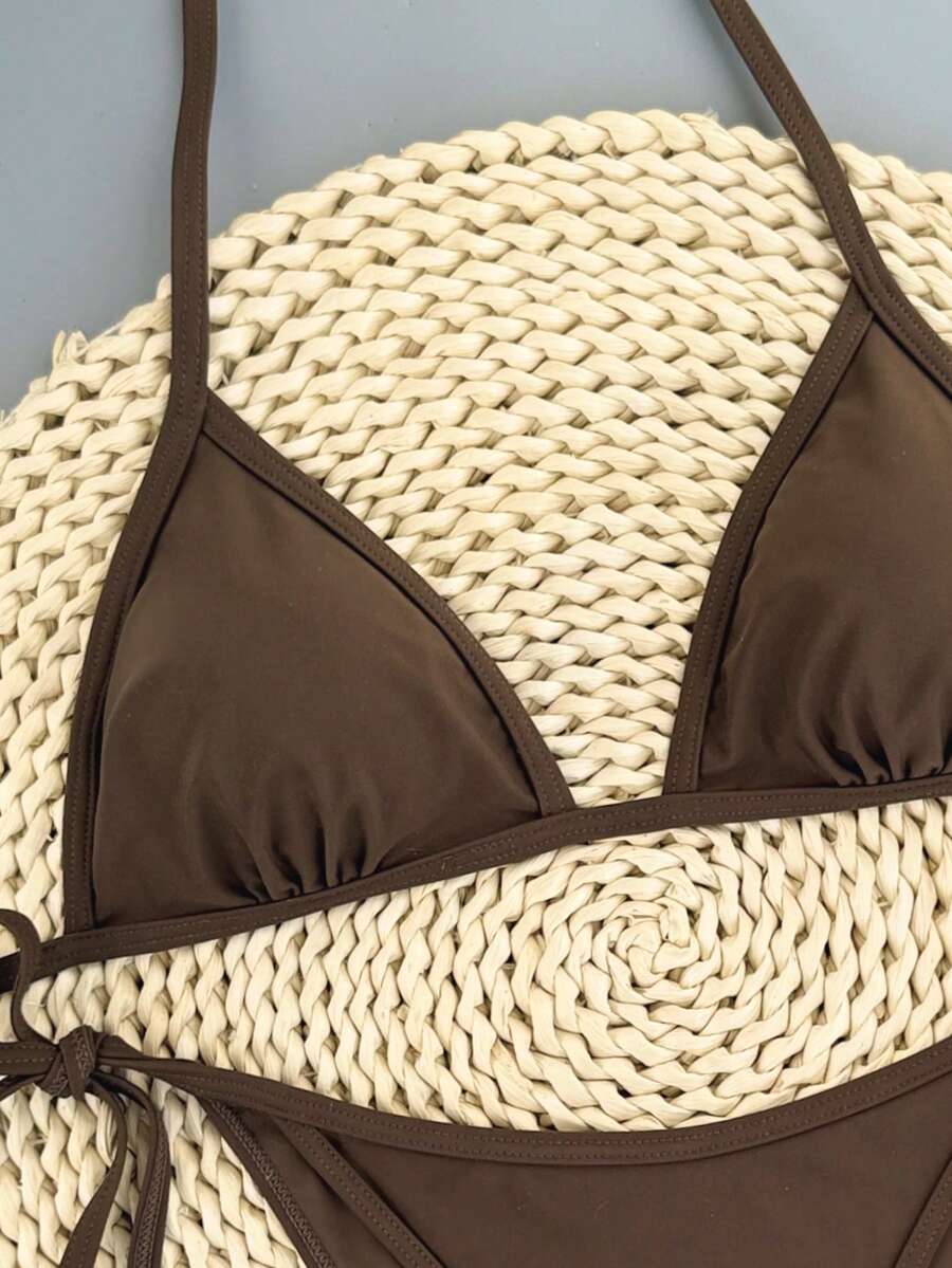 Women's apricot solid halter tie bikini top with triangle cups and matching tie-side swimsuit bottoms.