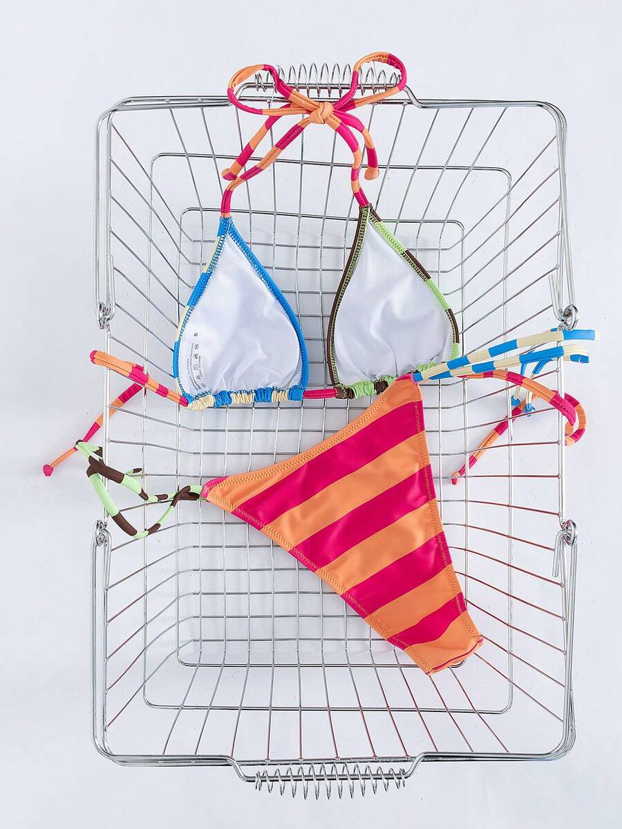 Women's striped halter bikini top with removable padding and matching tie-side low-waist swimsuit bottoms.