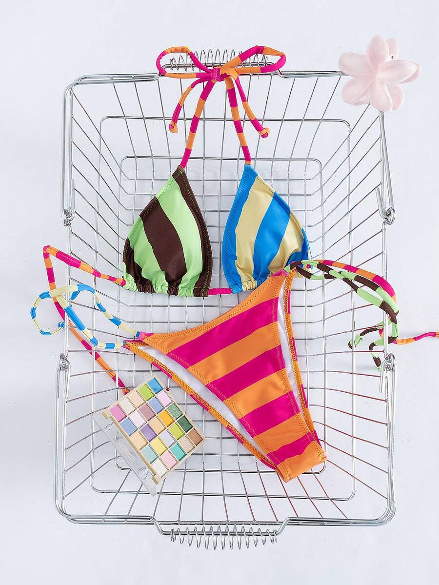 Women's striped halter bikini top with removable padding and matching tie-side low-waist swimsuit bottoms.