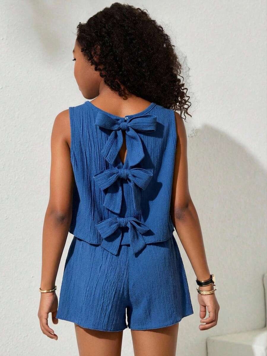 Tween girls casual blue tank top featuring round neck, textured fabric, and bow detail paired with matching shorts set.