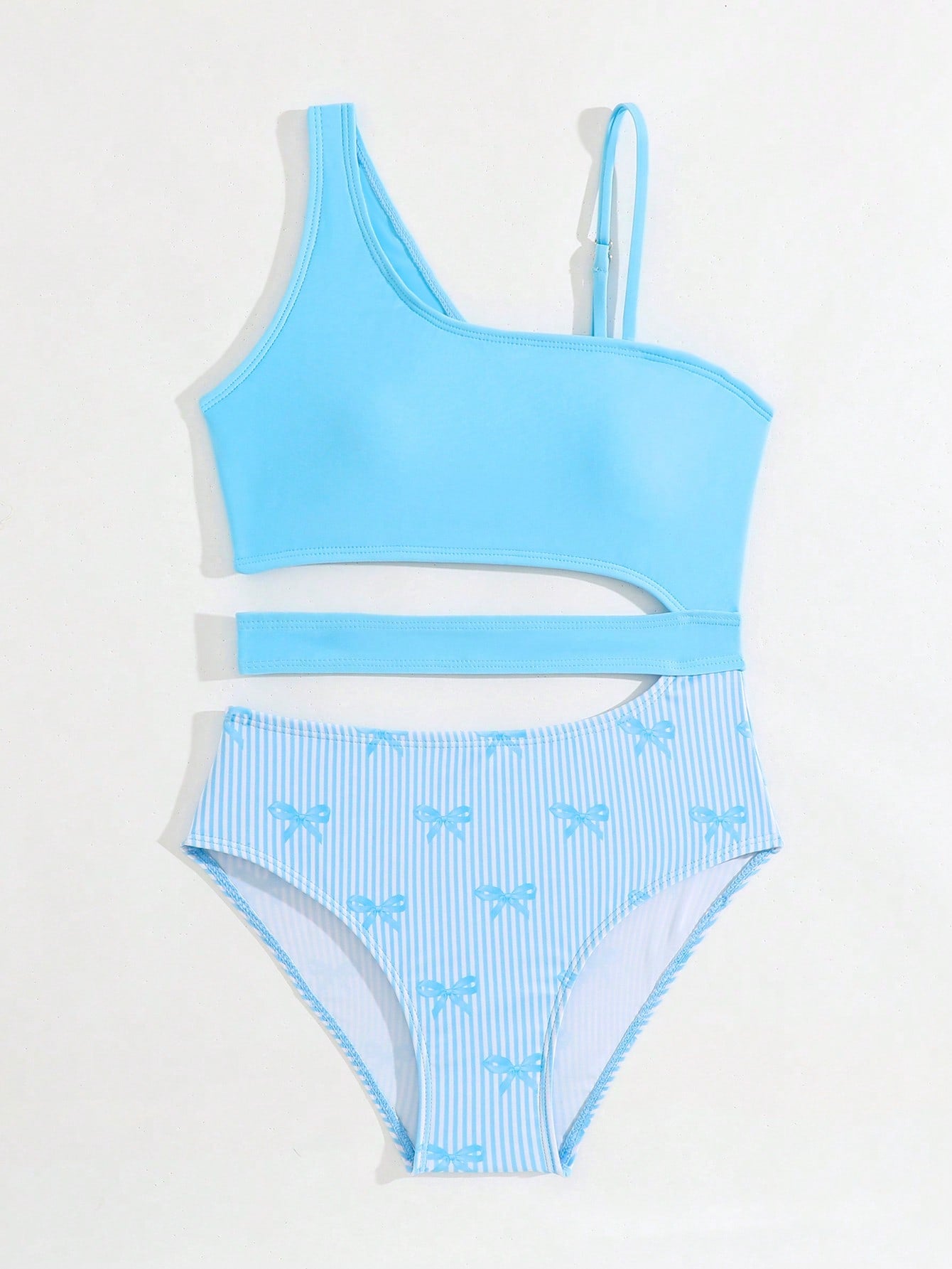 Purple tween girls one-piece swimsuit with asymmetrical neckline, cut-out waist, striped pattern, fitted silhouette, and lined body.