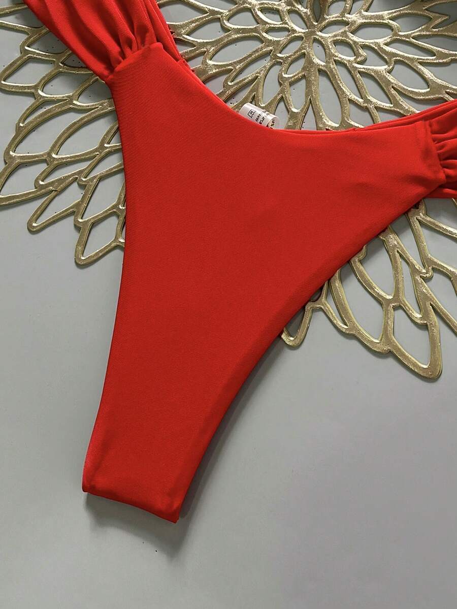 Women's 2-piece triangle cup bikini set in solid color featuring woven pearl shell decoration, halter neckline, and high-waist side-tie ruched bottoms.