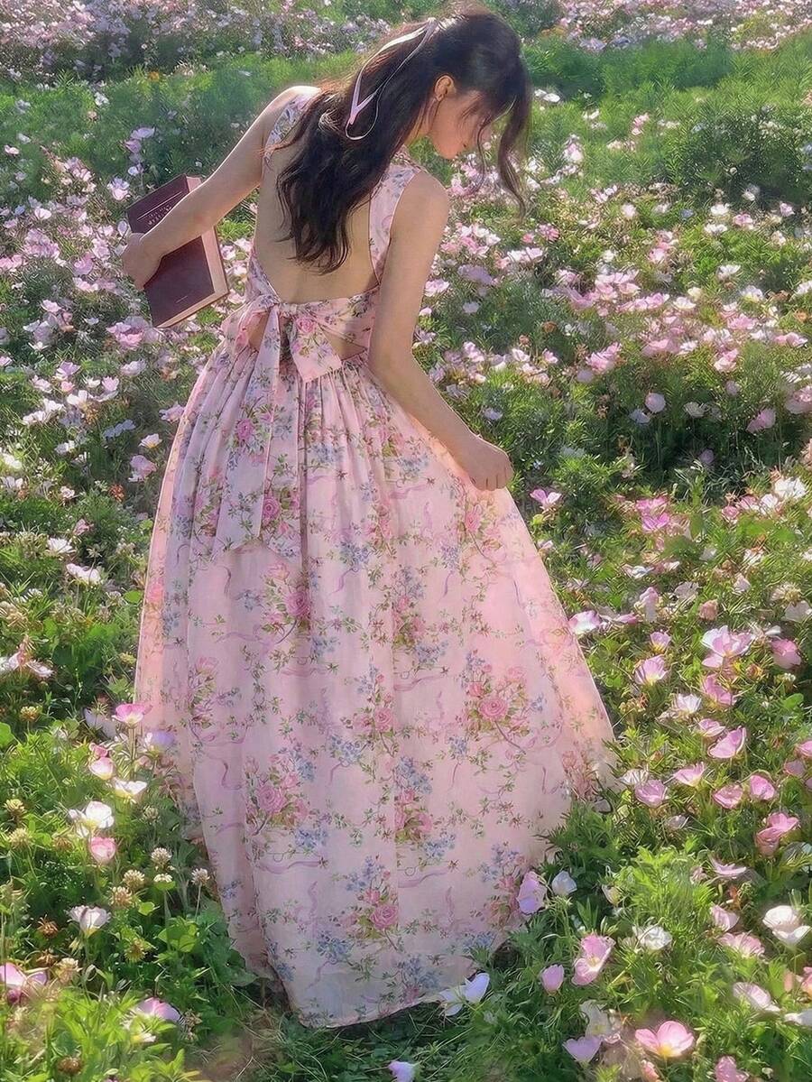 Tween girls pink floral sleeveless A-line midi dress featuring round neck, high waist with belt, contrast lace, and zipper back.
