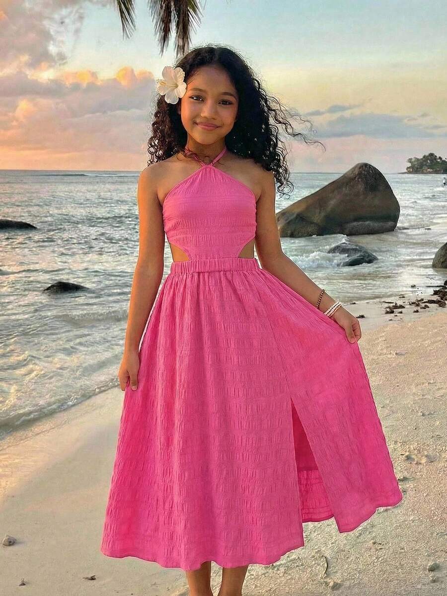Tween girls floral halter dress with backless sleeveless design, belted high waist, shirred details, appliques, and flared A-line midi silhouette for summer vacation or graduation outfit.