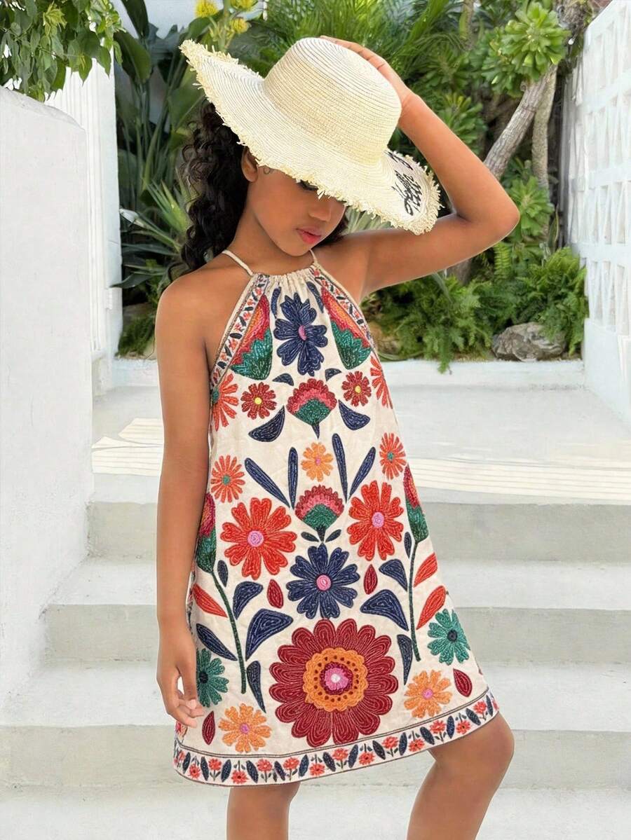 Tween girls floral halter A-line dress with contrast lace, applique and fringe details, sleeveless short length in polyester