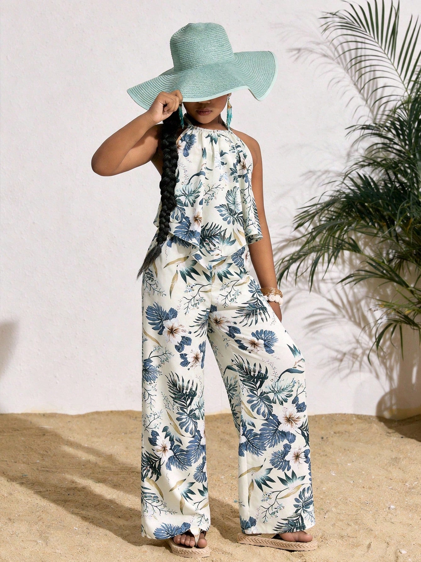 Tween girls casual apricot striped two-piece set featuring a sleeveless halter short top with curved hem and matching long pants.