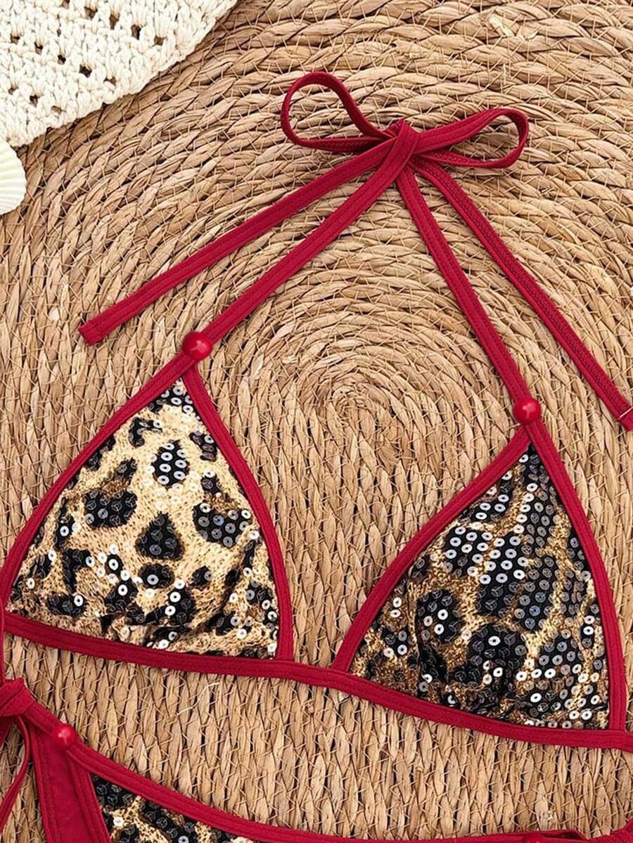 Women's apricot solid halter tie bikini top with triangle cups and matching tie-side swimsuit bottoms.