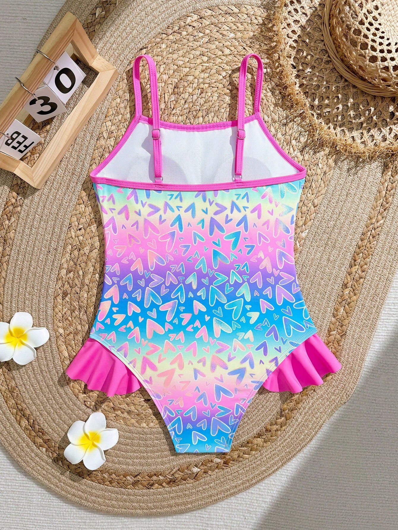 Tween girl plaid all-over print one-piece swimsuit with ruffle detail, spaghetti straps, fitted shape, and multicolor patchwork style for beach or pool wear.