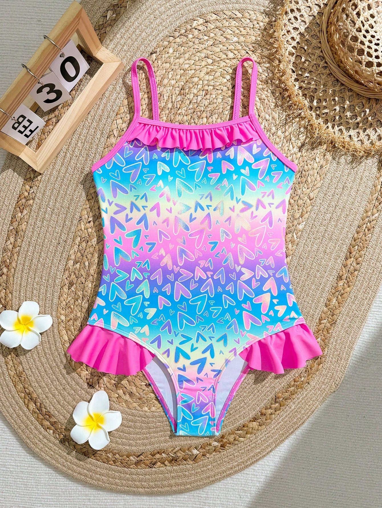 Tween girl plaid all-over print one-piece swimsuit with ruffle detail, spaghetti straps, fitted shape, and multicolor patchwork style for beach or pool wear.