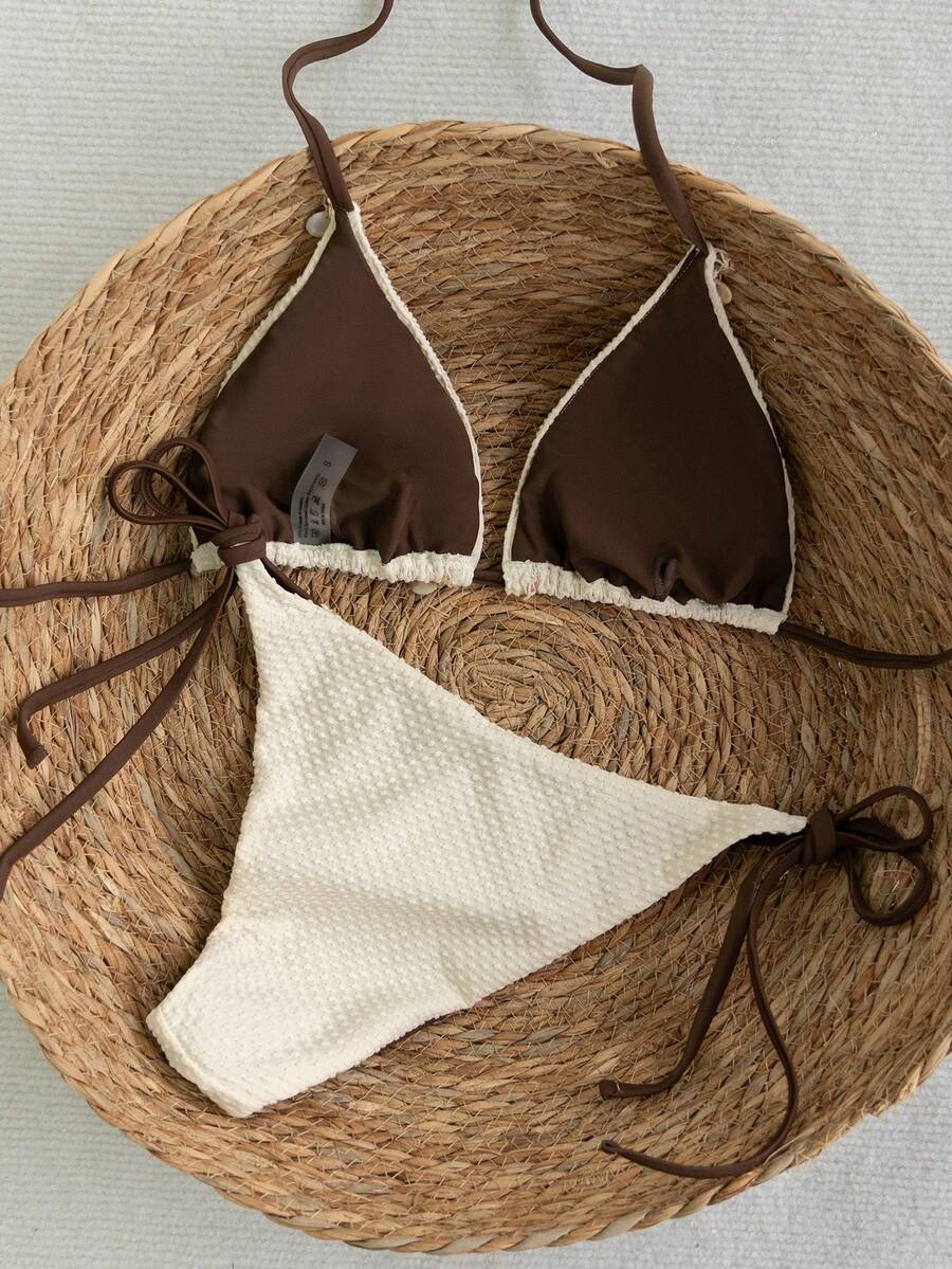 Apricot 2-piece bikini swimwear set featuring a textured halter triangle cup top with knot details and matching tie-side bottoms for women.