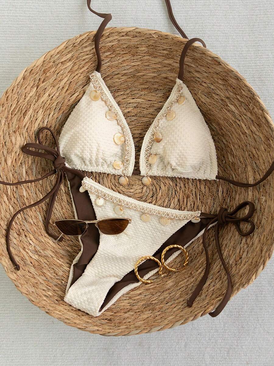 Apricot 2-piece bikini swimwear set featuring a textured halter triangle cup top with knot details and matching tie-side bottoms for women.