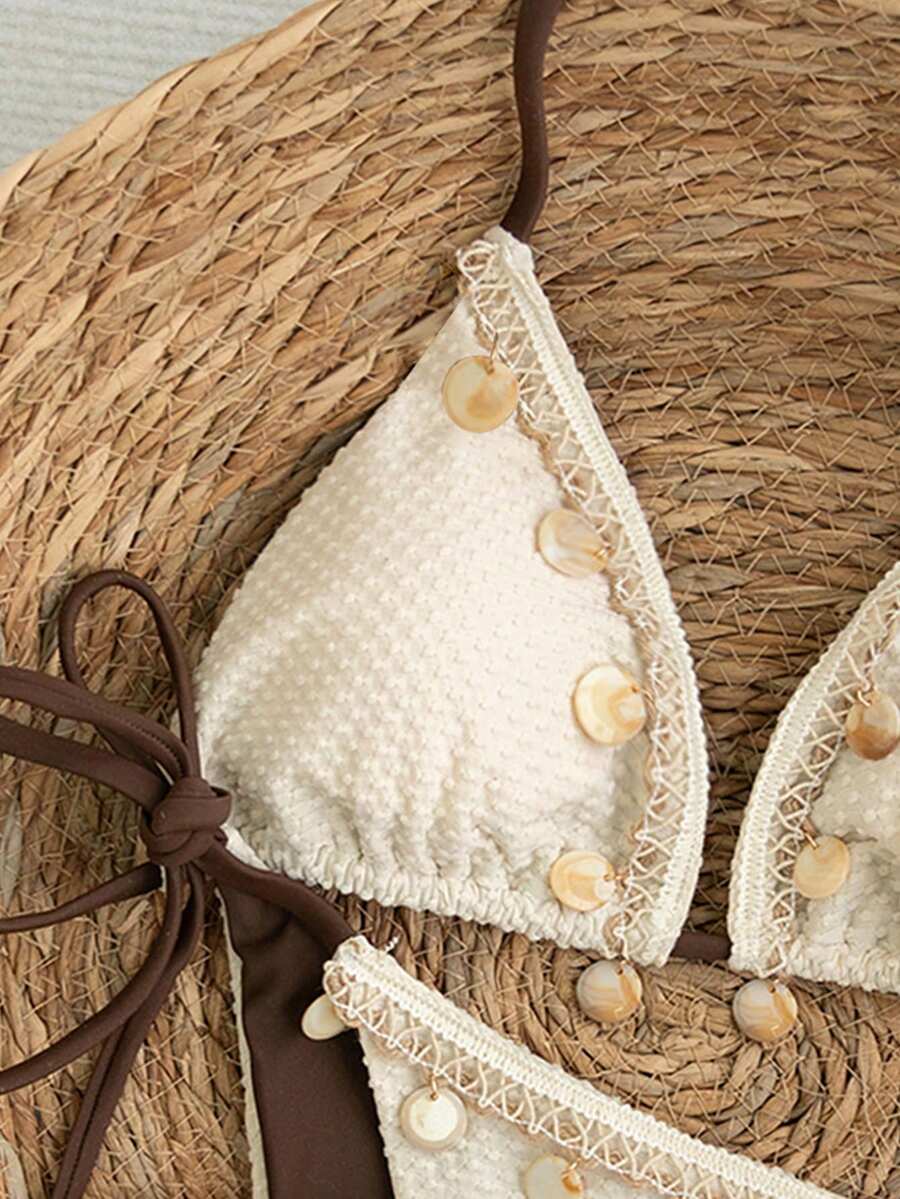 Apricot 2-piece bikini swimwear set featuring a textured halter triangle cup top with knot details and matching tie-side bottoms for women.
