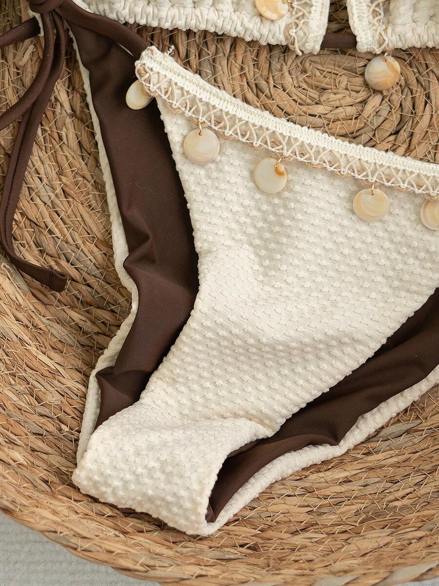 Apricot 2-piece bikini swimwear set featuring a textured halter triangle cup top with knot details and matching tie-side bottoms for women.
