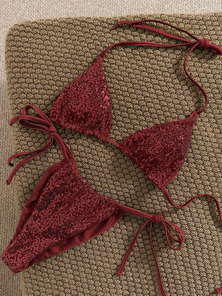 Women's apricot solid halter tie bikini top with triangle cups and matching tie-side swimsuit bottoms.