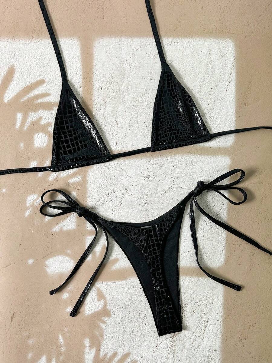 Black 2-piece snakeskin textured halter bikini set for women featuring high waist tie side bottoms and triangle cups.