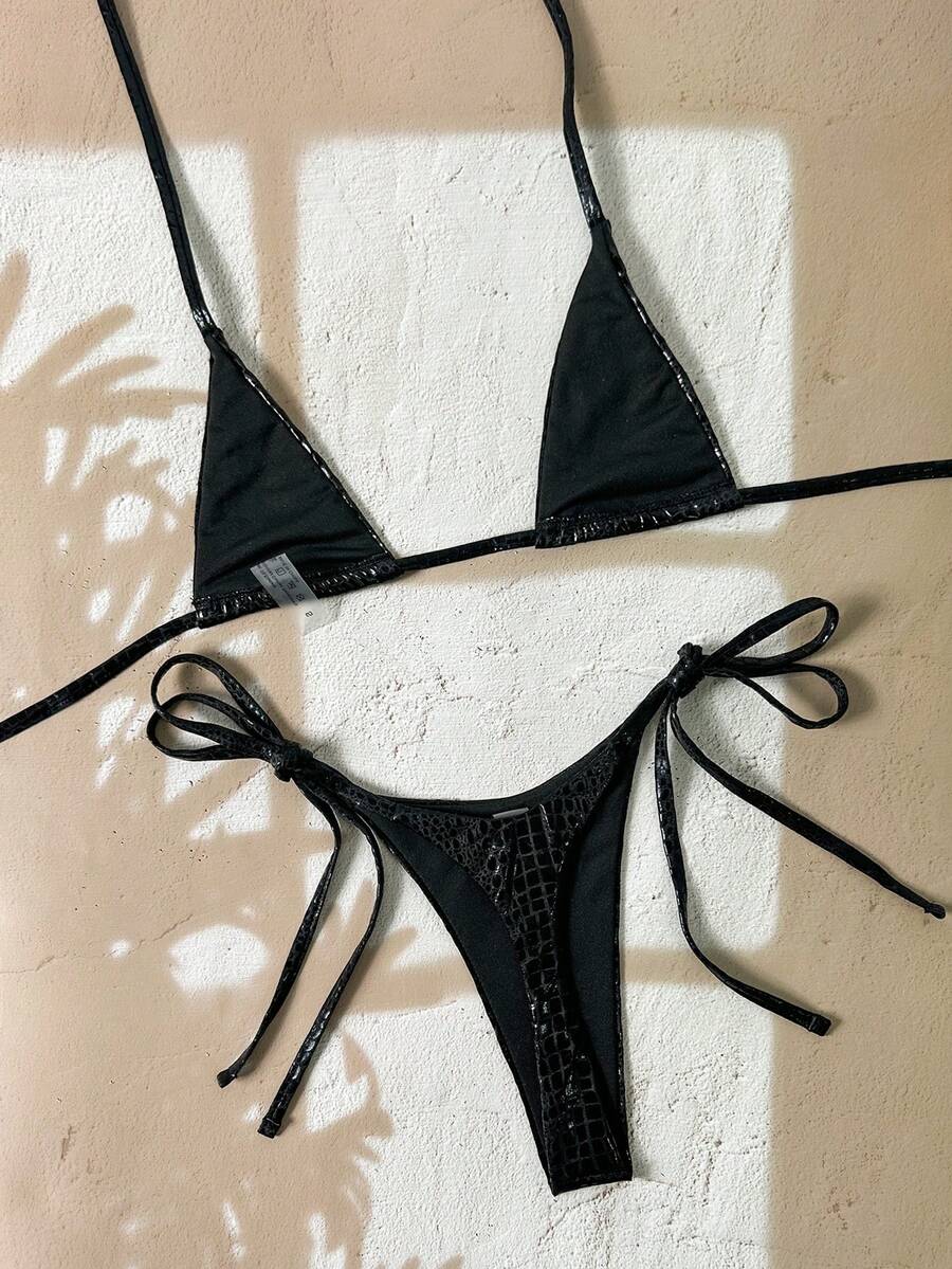 Black 2-piece snakeskin textured halter bikini set for women featuring high waist tie side bottoms and triangle cups.