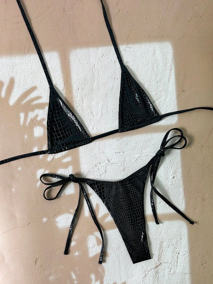 Black 2-piece snakeskin textured halter bikini set for women featuring high waist tie side bottoms and triangle cups.